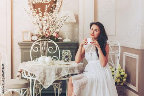Beautiful Woman With Cup of Tea or Coffee