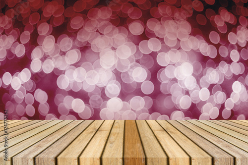 Wooden board empty table in front of light out of focus blurred background. Perspective brown wood over bokeh, can be used for display or present your products.Mock up your products