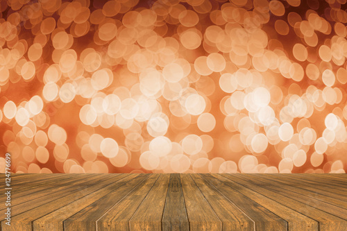 Wooden board empty table in front of light out of focus blurred background. Perspective brown wood over bokeh, can be used for display or present your products.Mock up your products