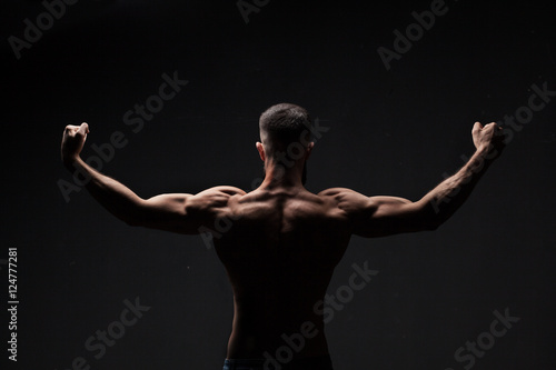 strong athletic mans back