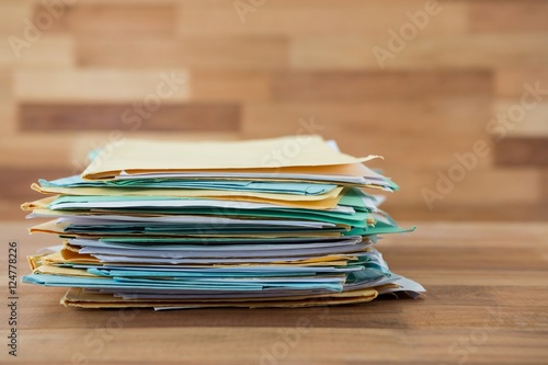 Stack of files on table photo