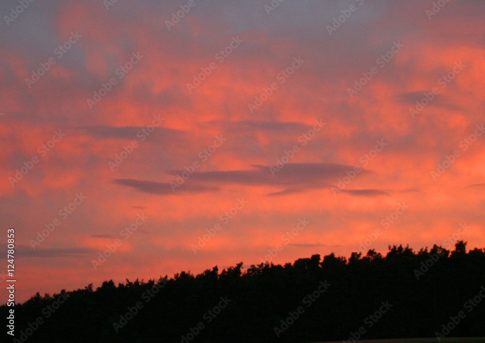 Fototapeta premium Sonnenuntergang mit Wolken