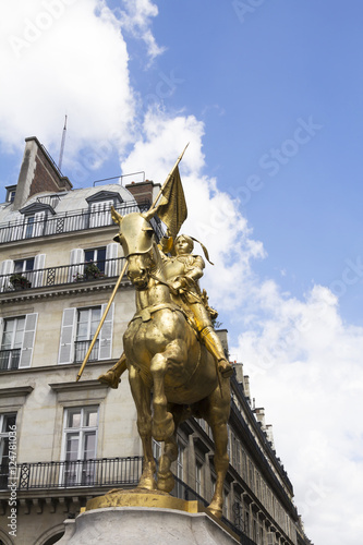 The golden statue of Saint Joan of Arc in Paris, France.