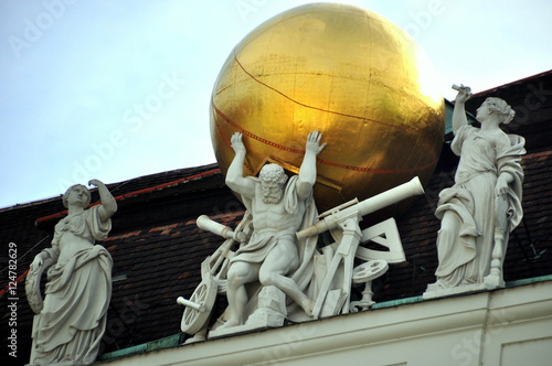 Wien - Figurengruppe auf dem Dach der Österreichischen Nationalbibliothek photo