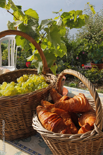 white grapes n croissants in basket