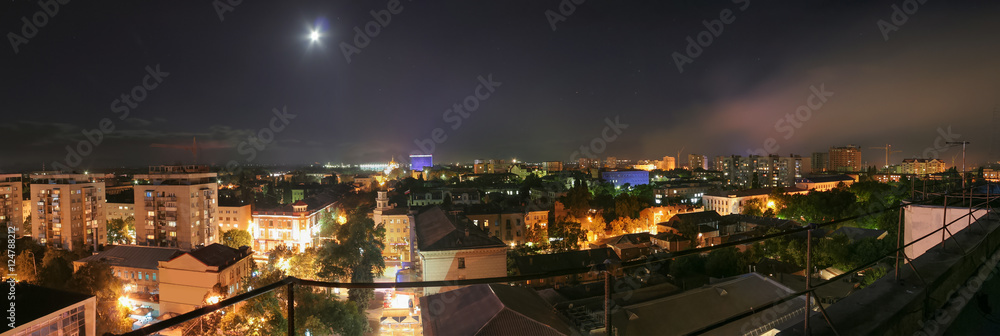 Obraz premium Panorama of night Krasnodar, Russia, full moon in the sky