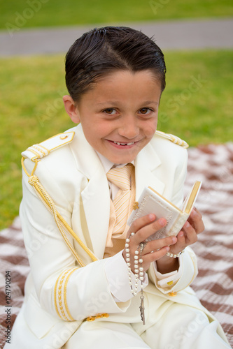Wallpaper Mural Young First Communion boy smiling with prayer book and rosary Torontodigital.ca