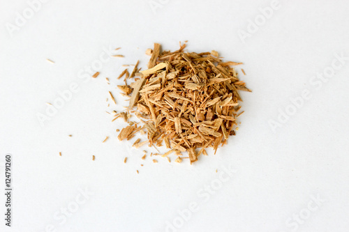 Natural incense sandalwood isolated on a white background photo