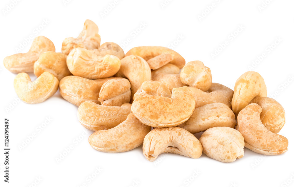 Cashew nuts heap handful on white Cashew nuts heap handful on white