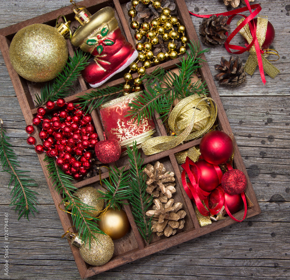 Ribbons, beads, toys, Christmas crafts in a wooden box. Ribbons, beads, toys, Christmas crafts in a wooden box.