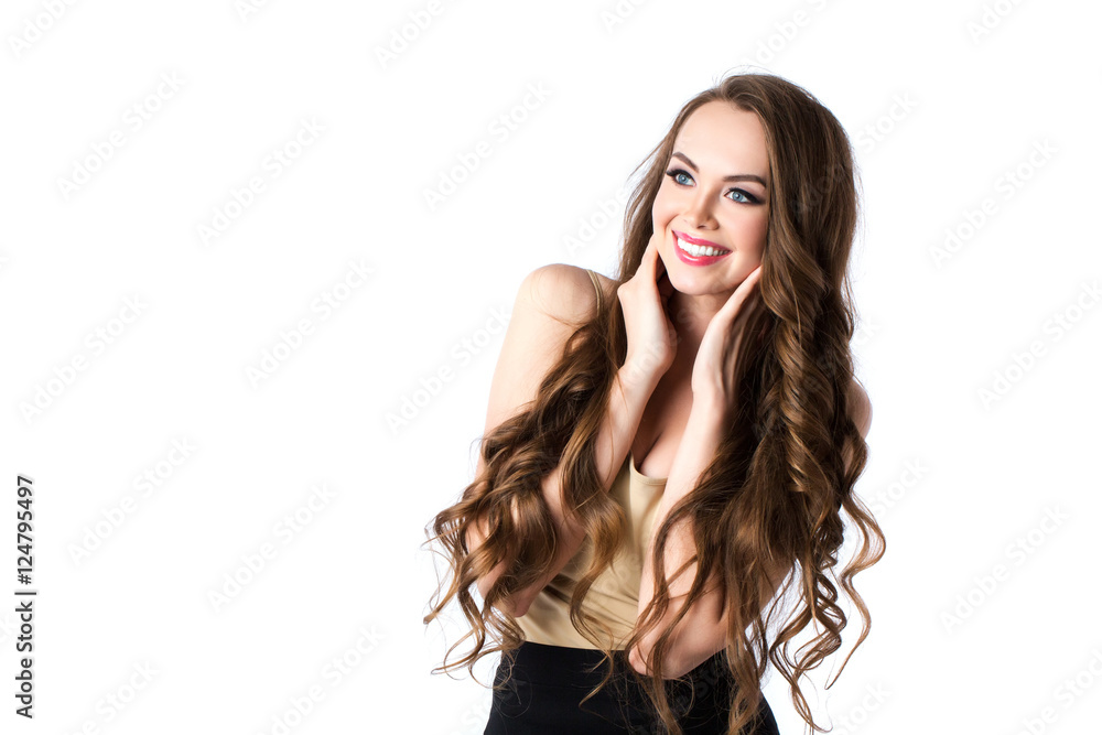 Beautiful woman with long brown curly hair.