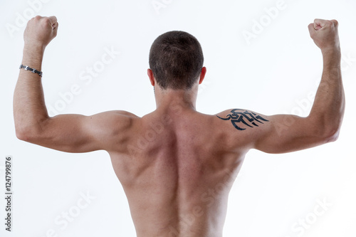 man from behind raising up his arms