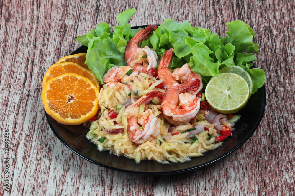 Home made,Spicy sour minced green mango salad with shrimp topped sliced green lemon,Chinese orange and lettuce. Home made,Spicy sour minced green mango salad with shrimp topped sliced green lemon,Chinese orange and lettuce.