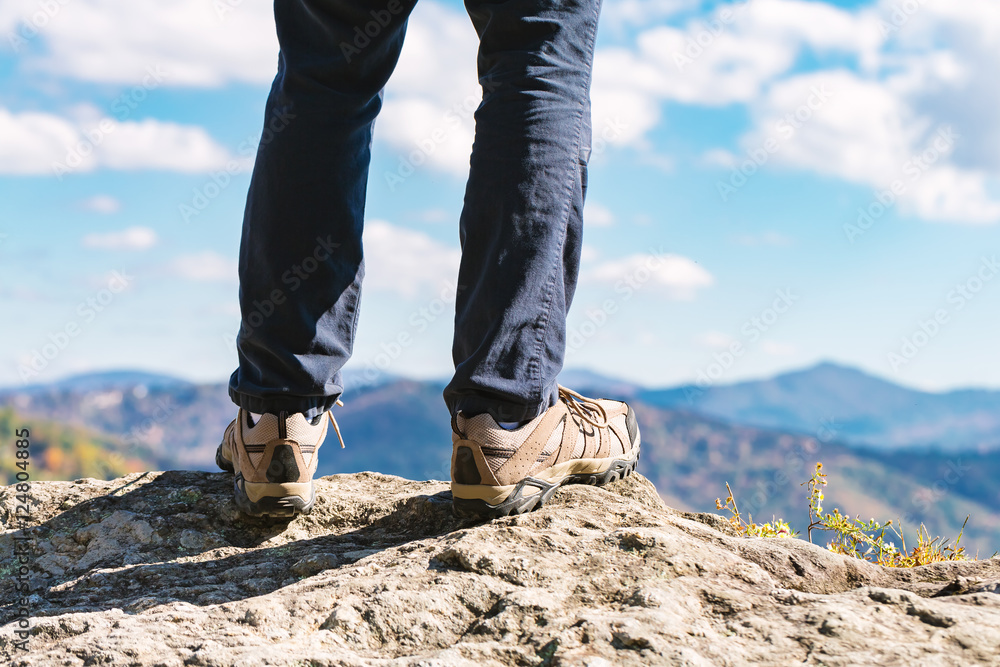Man at the edge of a cliff Man at the edge of a cliff