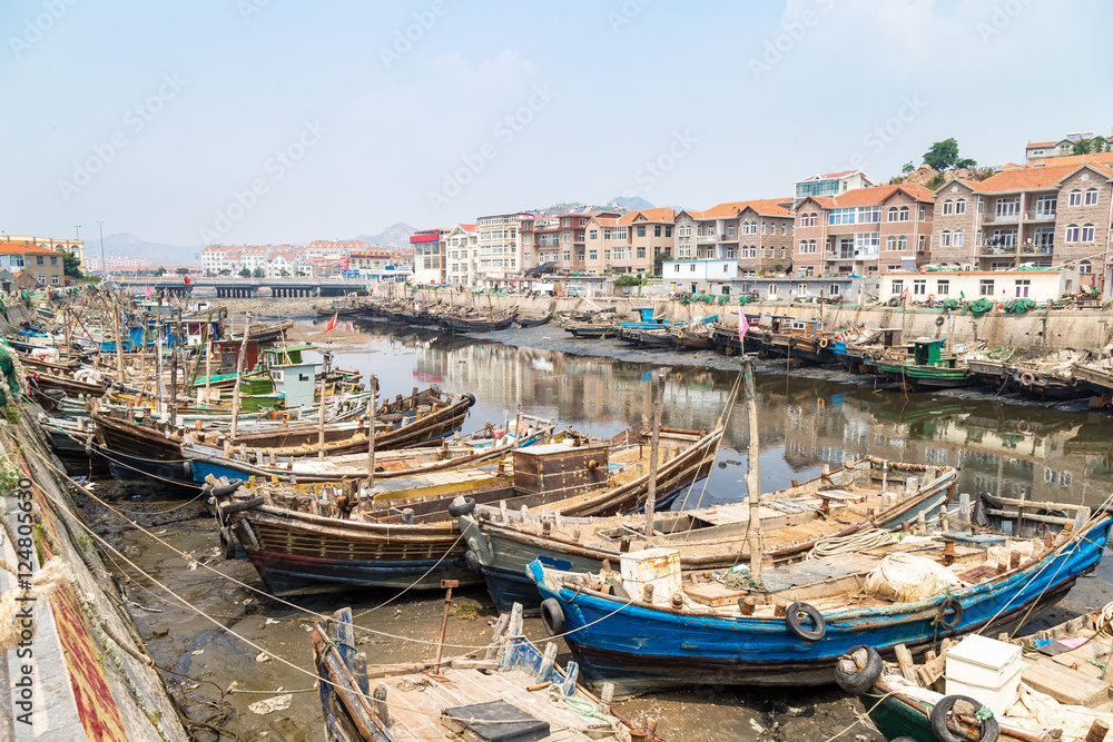 Wooden fishing boats in the village of Shazikou, in the outskirts of Qingdao, Shandong, China