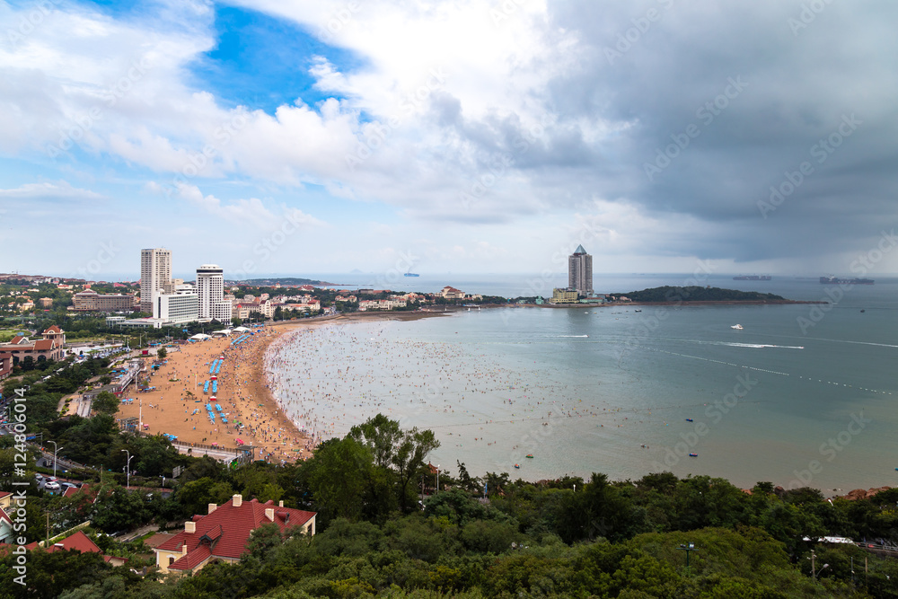View of bathing beach N1 from the hill of Xiao Yu Shan Park in a rainy day in summer, Qingdao, Shandong province, China