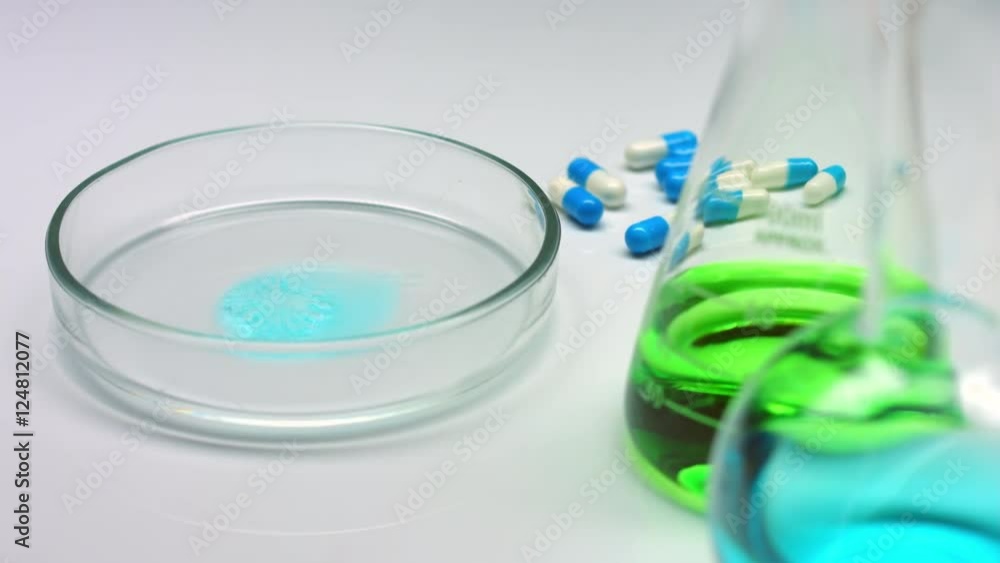 Chemical reaction in petri dish, chemistry experiment Chemical reaction in petri dish, chemistry experiment