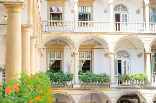 Wallpaper Mural Architecture. Facade of beautiful building with colomn and balconies, and flowers on it. Torontodigital.ca