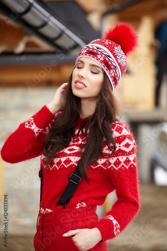 happy young woman in ski cothes outdoors photo