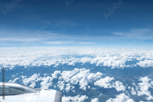 Skyline at air plane above clouds with city view under cloud,aerial view landscape.