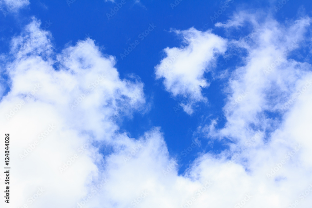 Obraz premium Blue sky background with white clouds. The vast blue sky and clouds sky on sunny day. White fluffy clouds in the blue sky.