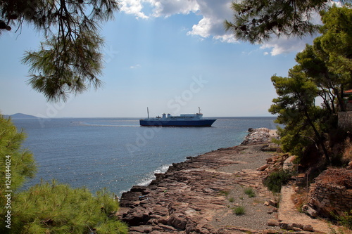 The ship sails into the port of Patitiri,Greece photo