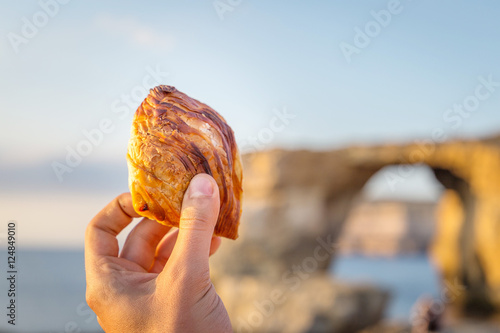 Pastizz, Traditional Maltese Food on Azure Window Background, Gozo, Malta