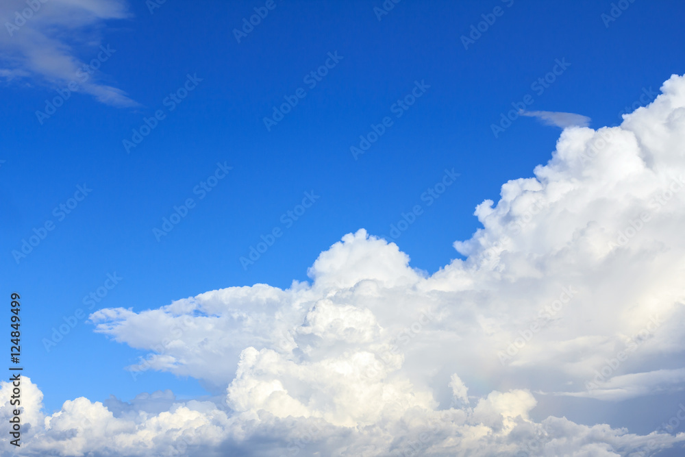 Fototapeta premium Blue sky background with white clouds. The vast blue sky and clouds sky on sunny day. White fluffy clouds in the blue sky.