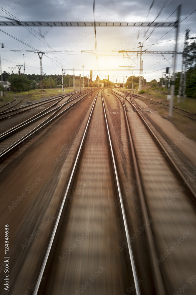 Fototapeta premium Train Rails Sunset Blurred Motion View