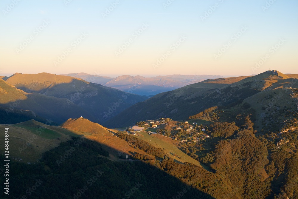 Obraz premium Sunrise over Bolognola village