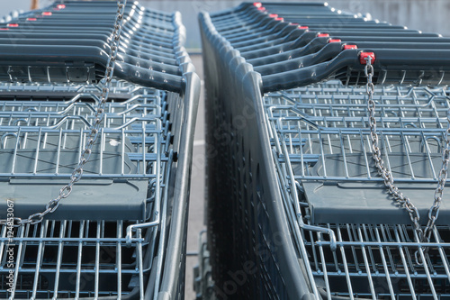 Wire modern supermarket shopping cart  symbol of consumerism