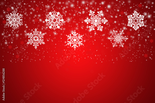 White snowflakes on an abstract red background