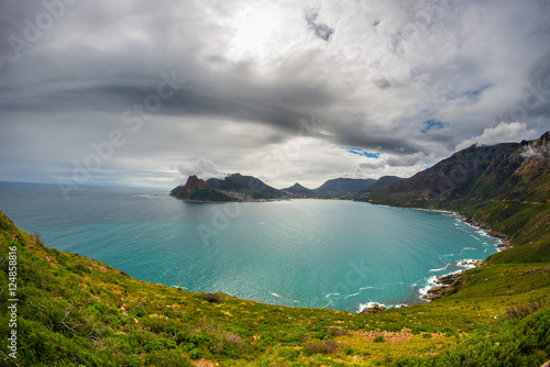 Fisheye ultrawide view of Hout Bay, Cape Town, South Africa, from Chapman's Peak. Winter season, cloudy and dramatic sky.
