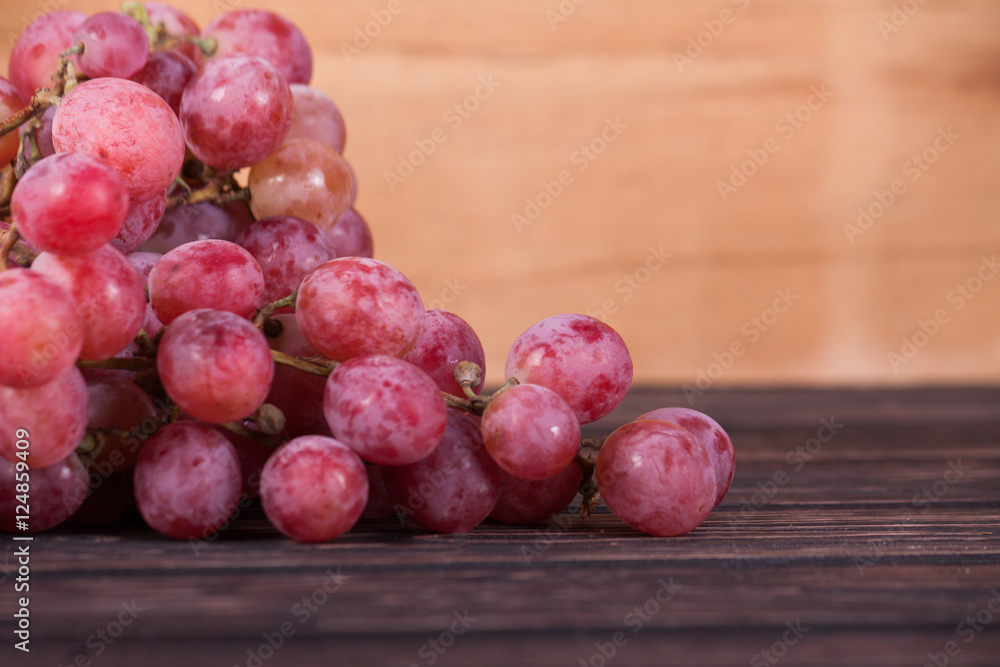 Red grapes on wood Red grapes on wood