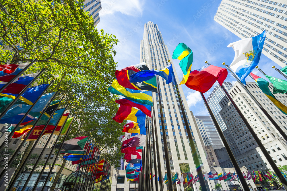 Naklejka premium International flags fying in Midtown Manhattan, New York City
