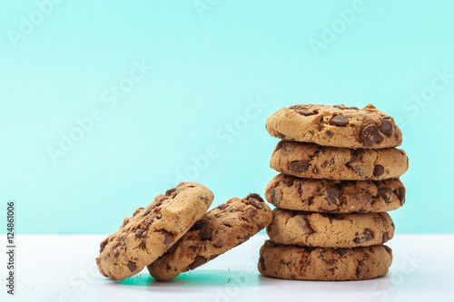 chocolate chunk cookies on a bright blue background