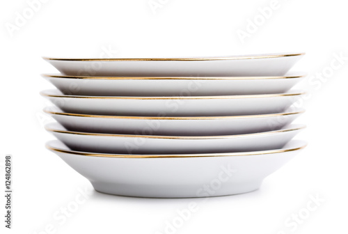 stack of porcelain plates © arbalest