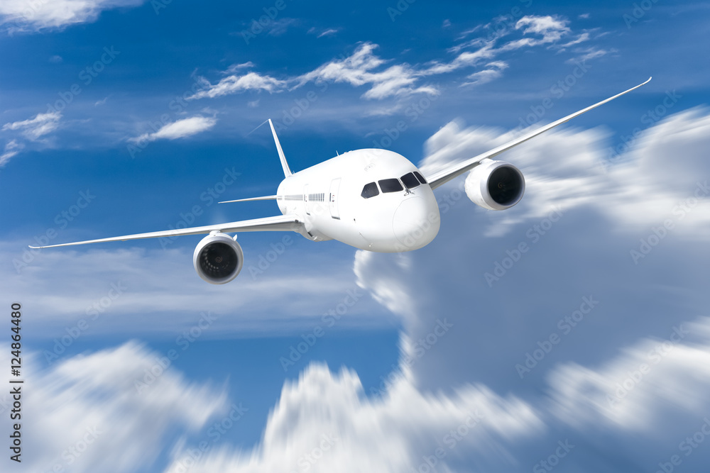 Obraz premium Podróż samolotem, samolot latający w błękitne niebo nad chmurami