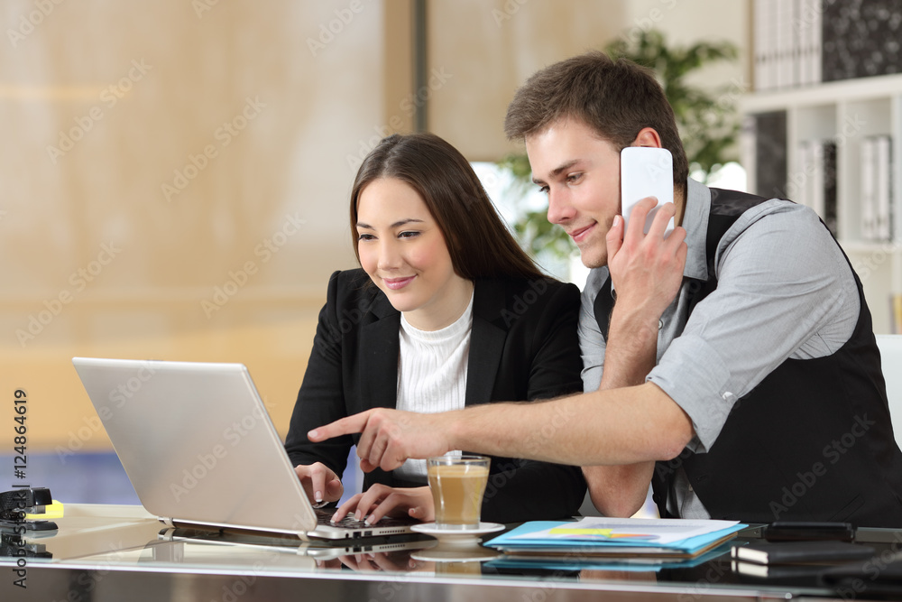 Coworkers working together online Coworkers working together online