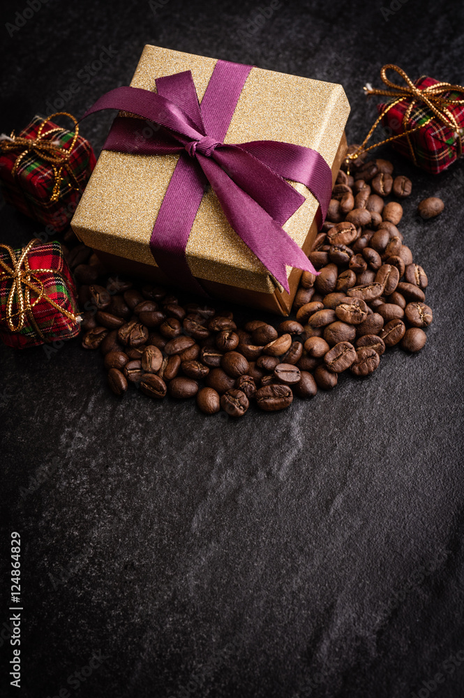 roasted coffee beans with black paper on wooden background, can be used as a background roasted coffee beans with black paper on wooden background, can be used as a background