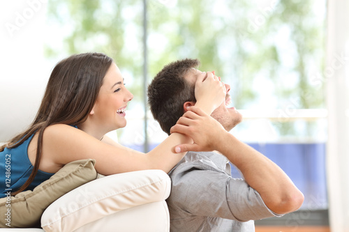 Playful couple at home