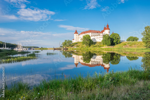 Summer evening by Lake Vanern and Lacko Castle. Lacko Castle is considered as one of the most beautiful castles in Sweden.