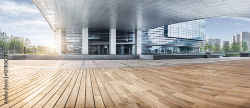 office building entrance with wooden floor foreground,china.