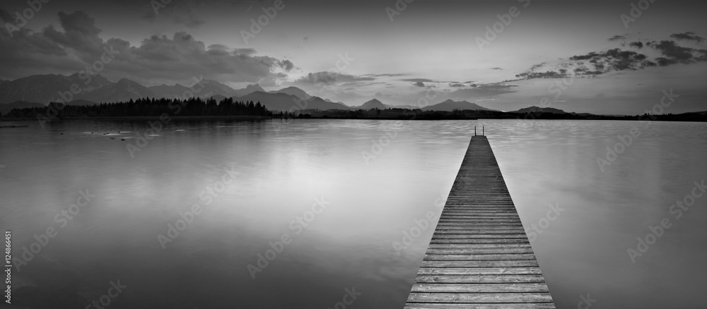 Long Wooden Pier into Lake Hopfensee in the Bavarian Alps, Black and White