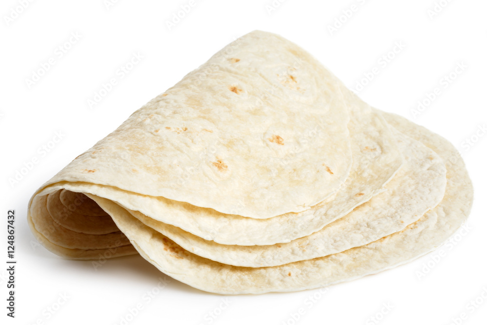 Stack of folded tortilla wraps  isolated on white.