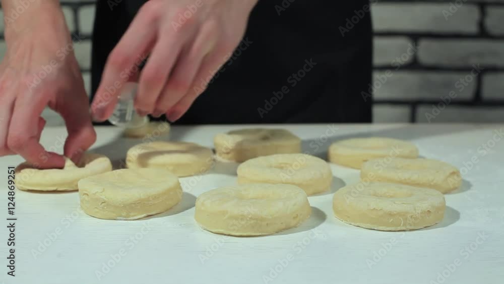 woman doing the form for donuts woman doing the form for donuts
