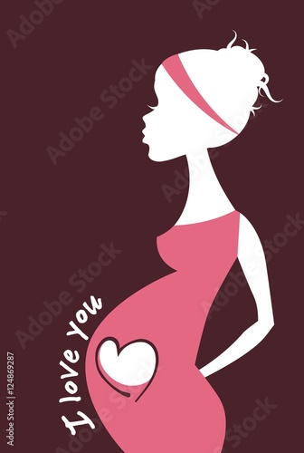 Silhouette of pregnant woman touching her belly