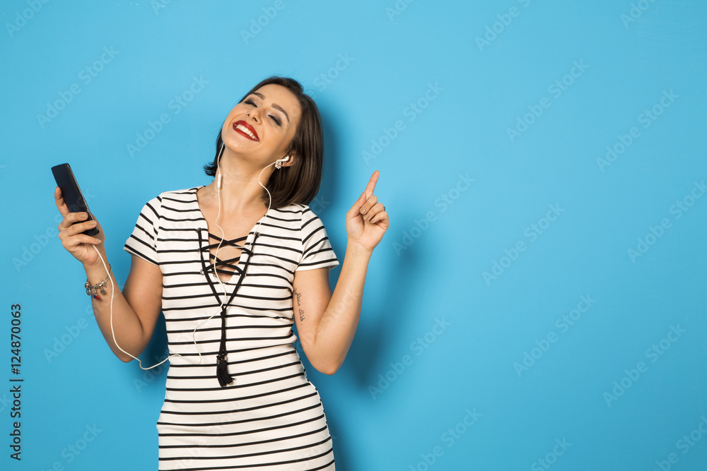 beautiful Brazilian girl enjoying music with the head phones in beautiful Brazilian girl enjoying music with the head phones in