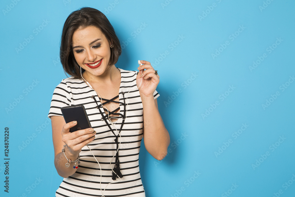 beautiful Brazilian girl enjoying music with the head phones in beautiful Brazilian girl enjoying music with the head phones in