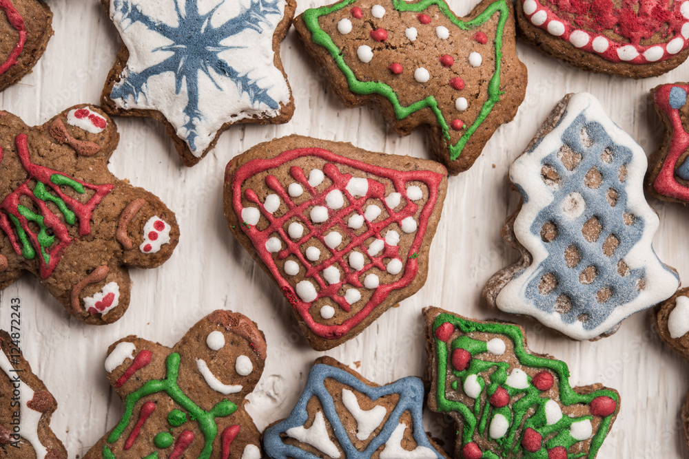Christmas homemade gingerbread cookies on wooden table Christmas homemade gingerbread cookies on wooden table